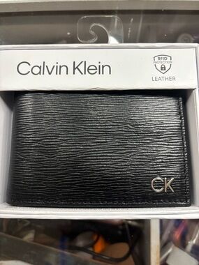 Calvin Klein Black Textured Leather Wallet with CK Accent